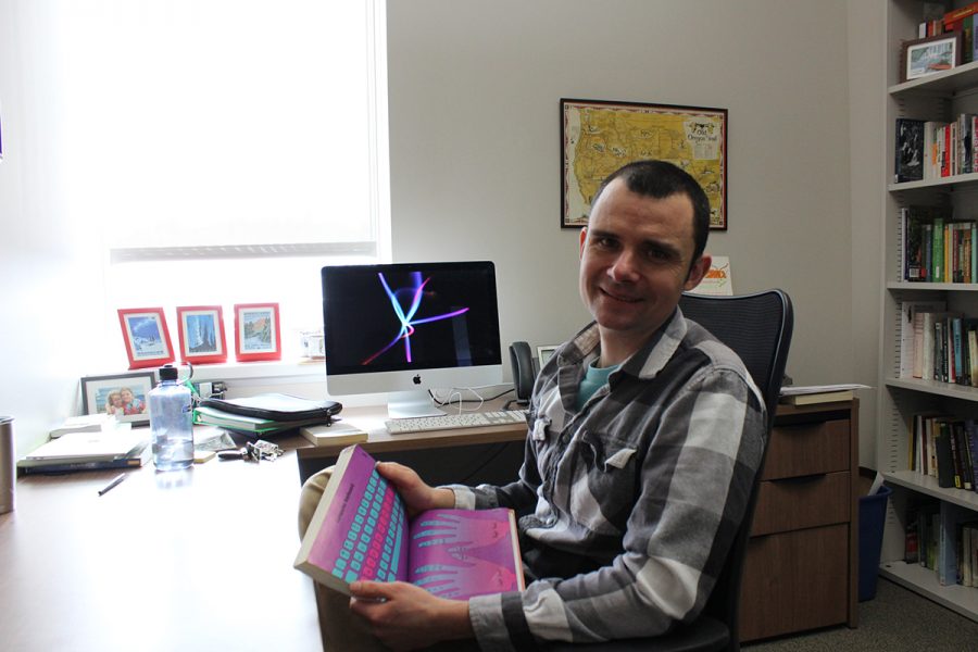 BJ Hollars holding “Writers Express” — the book that he said inspired him to become a writer.