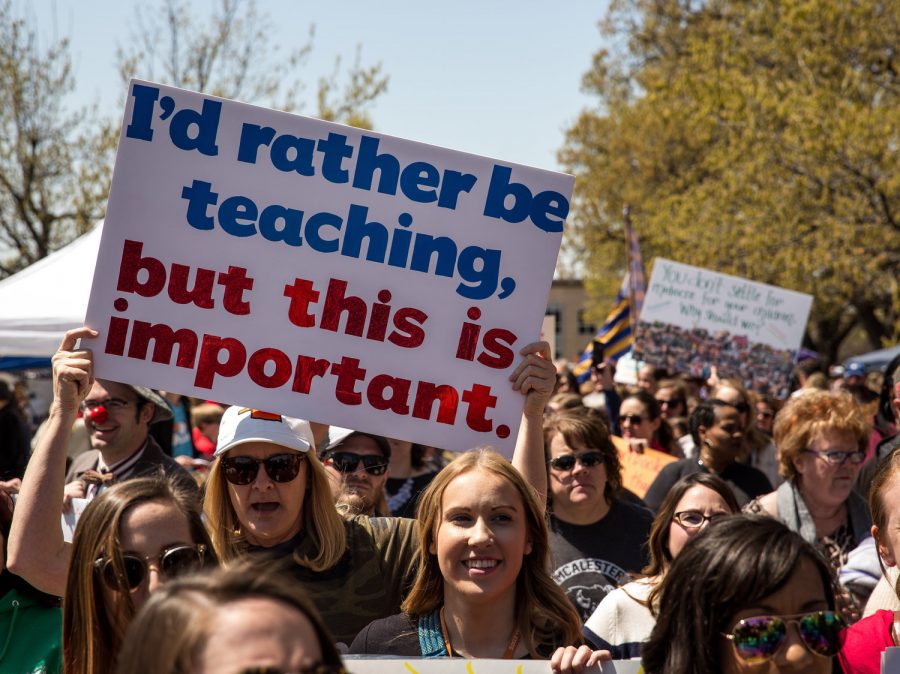 Teachers rallying for support at a walkout in 2018.
