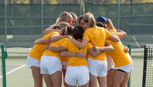 UW-Eau Claire women’s tennis team huddles up in their win against UW-La Crosse during their fall season 