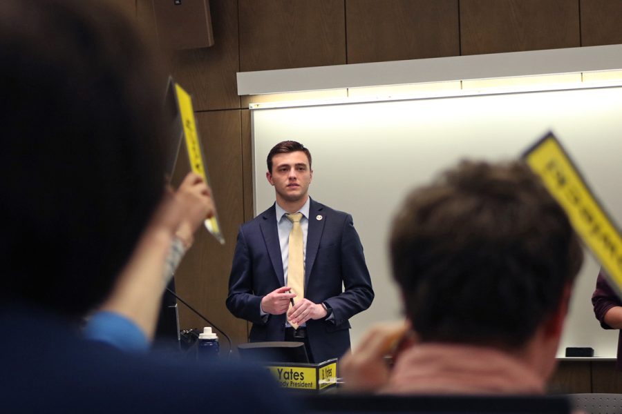Student Body President Branden Yates counts the votes for the proposed allocation to the Student Organization of Latinos and Latinas, which was also passed on Monday by Student Senate.
