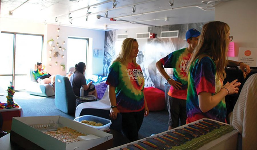 Students enjoy an afternoon in the Rainbow Floor lounge, a floor specifically for LGBTQ students and allies to find an inclusive place to live