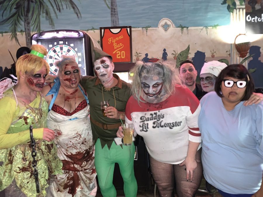 The Zombie Eau-pocalypse featured seven bars downtown on Saturday, October 19. Dozens of Eau Claire locals donned bloodstained clothes and milky-green faces to move from location to location. 