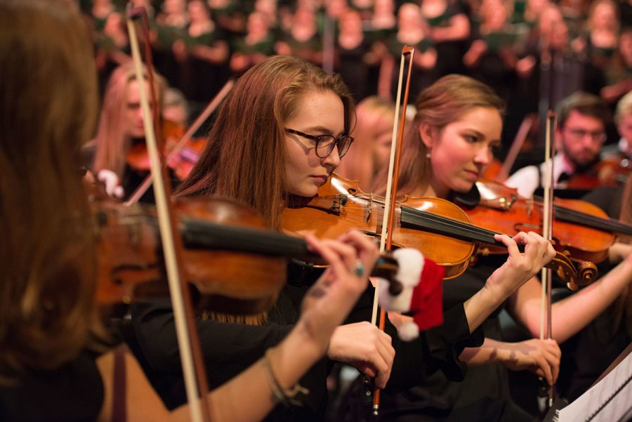 Various music groups from UW-Eau Claire perform at the Pablo Center during the 45th annual holiday concert. Each group played two to three pieces total,  with 26 pieces performed in total.