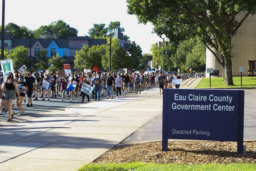 Demonstrators march in the Justice for Jacob Blake Solidarity Protest Aug. 29, which began in Randall Park and ended outside the Eau Claire County Government Center. Selika Ducksworth-Lawton, history professor at UW-Eau Claire, president of Uniting Bridges of Eau Claire and a speaker and organizer of the event, said she estimated around 2,000 people participated.