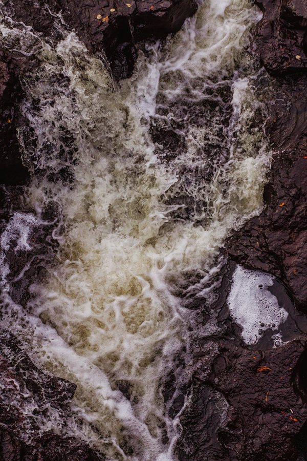 Rushing waters of the Temperance River flow into Lake Superior.