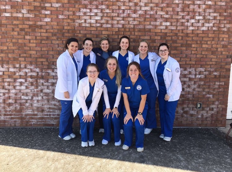 Lucy Hobbs (back row, second from right) poses with other nursing students before the COVID-19 pandemic began. “I am so excited to start working and practicing as a nurse,” Hobbs said.