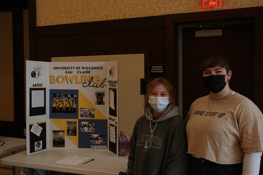 First-year students at UW-Eau Claire, Maggie Burhans and Allie Williams, promote the UW-Eau Claire Bowling Club at BOB