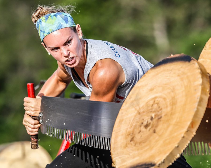 A lumberjack competes in one of the championship’s sawing events.
