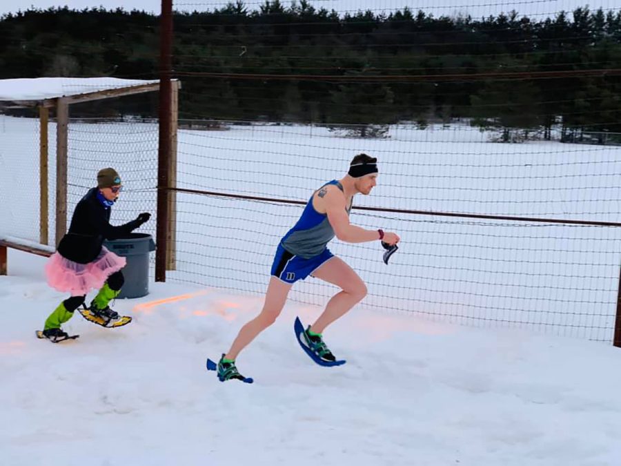 Locals compete in the Eau Claire Snowshoe Beer Mile