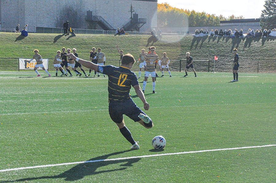Max Walters fires a shot at the Oles’ goal.