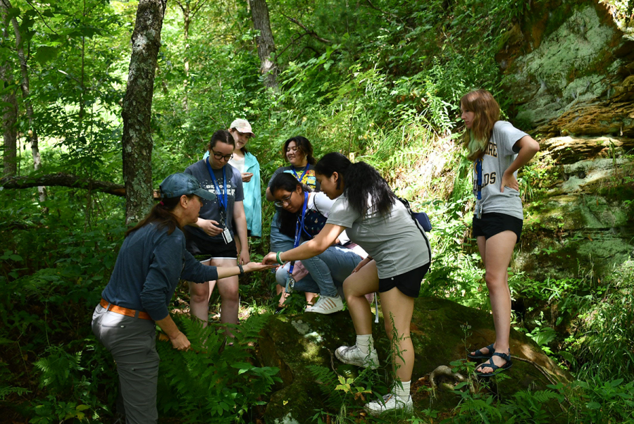 A group of GeoPaths students conducts field research.