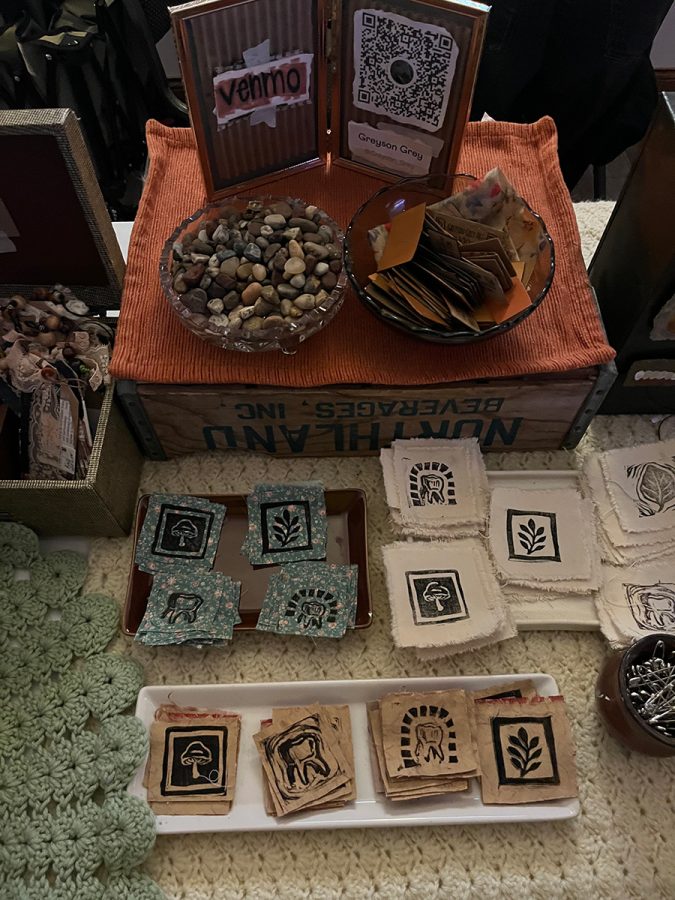 Handmade art and textiles on display at Greyson Grey’s table.