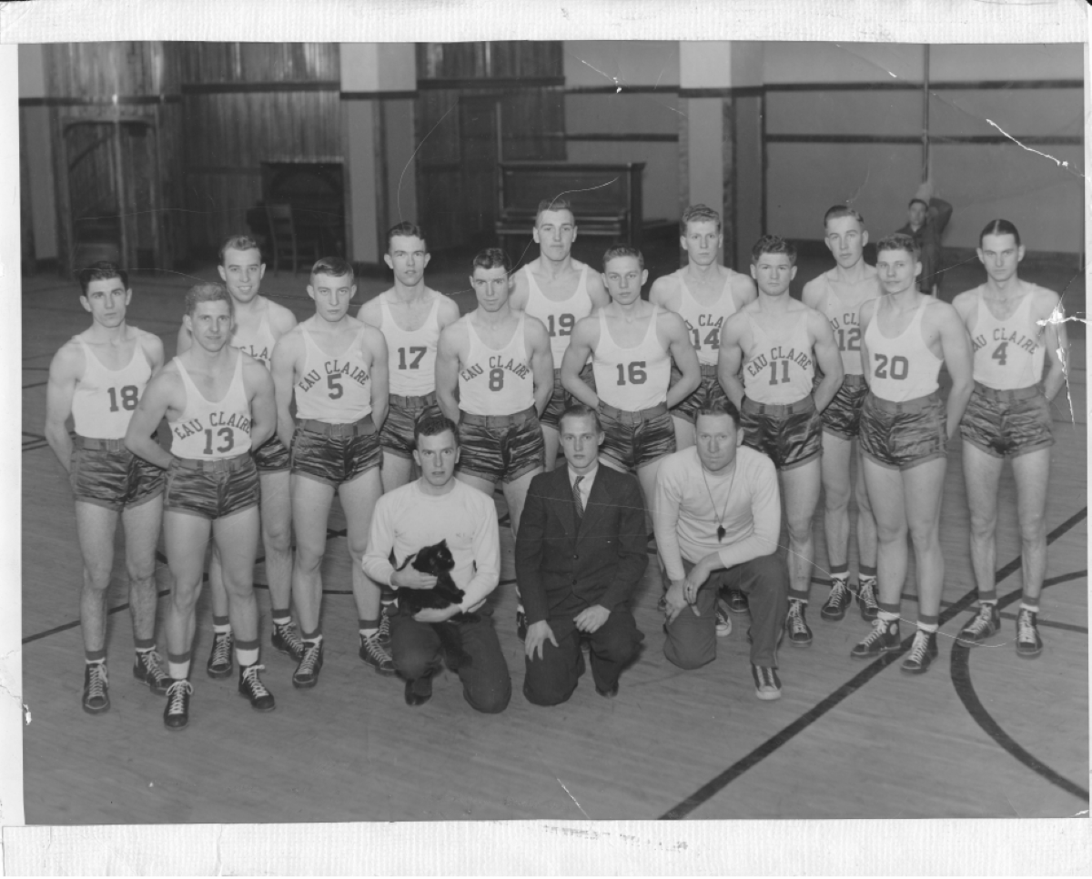 A photo of Toughy with the 1937-38 men’s basketball team. Courtesy of McIntyre Library