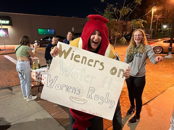 Female rugger Serenna Snider dressed in a hot dog costume for the fundraiser.