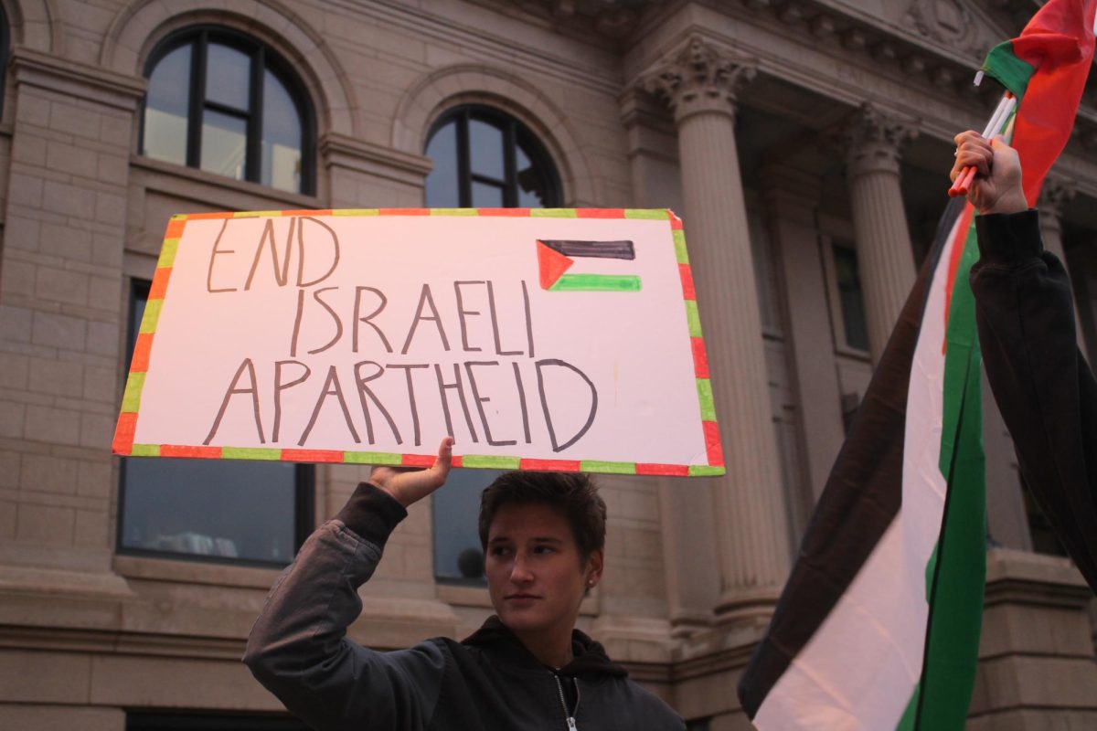 People supported Palestine outside Eau Claire City Hall Wednesday night.
