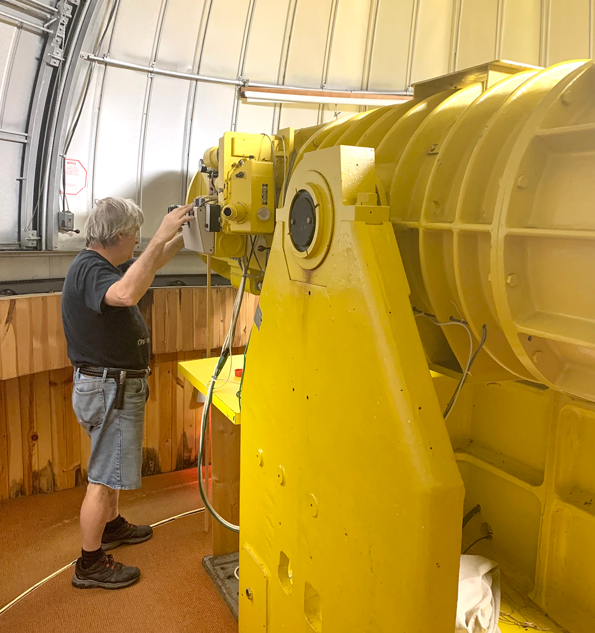 CVAS President Emmett Kyle adjusts the telescope in the west dome.