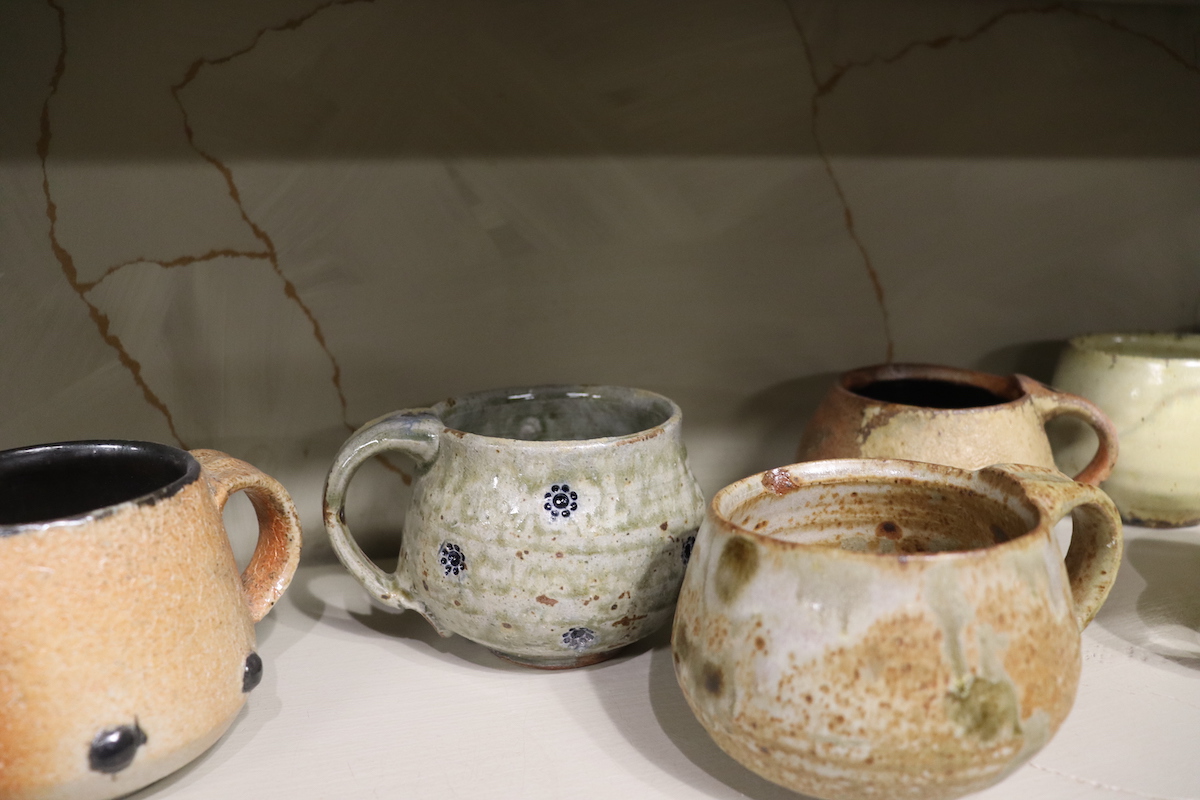 A variety of colorful mugs were on display at the show. 

