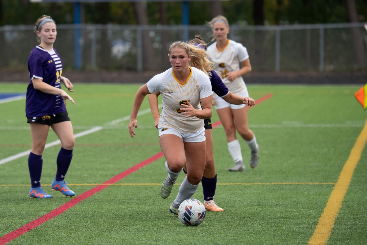 Elise Pinewski, third-year student, kicking the ball from UW-Platteville. (Photo by Bill Hoepner, used with permission from Blugold Athletics)
