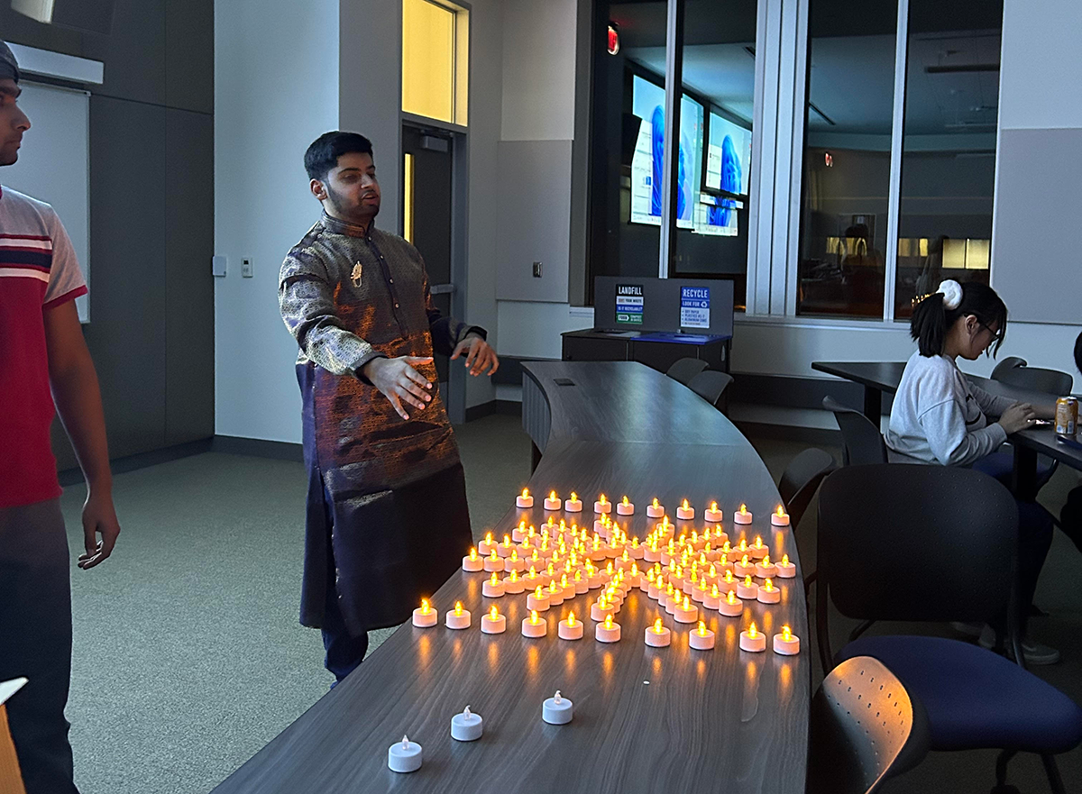 Students attended an event celebrating an Indian holiday known as Diwali on Nov. 17 in Centennial Hall. Diwali symbolizes the victory of light overcoming darkness and is often represented with candles to signify bringing light into the homes of those who celebrate.