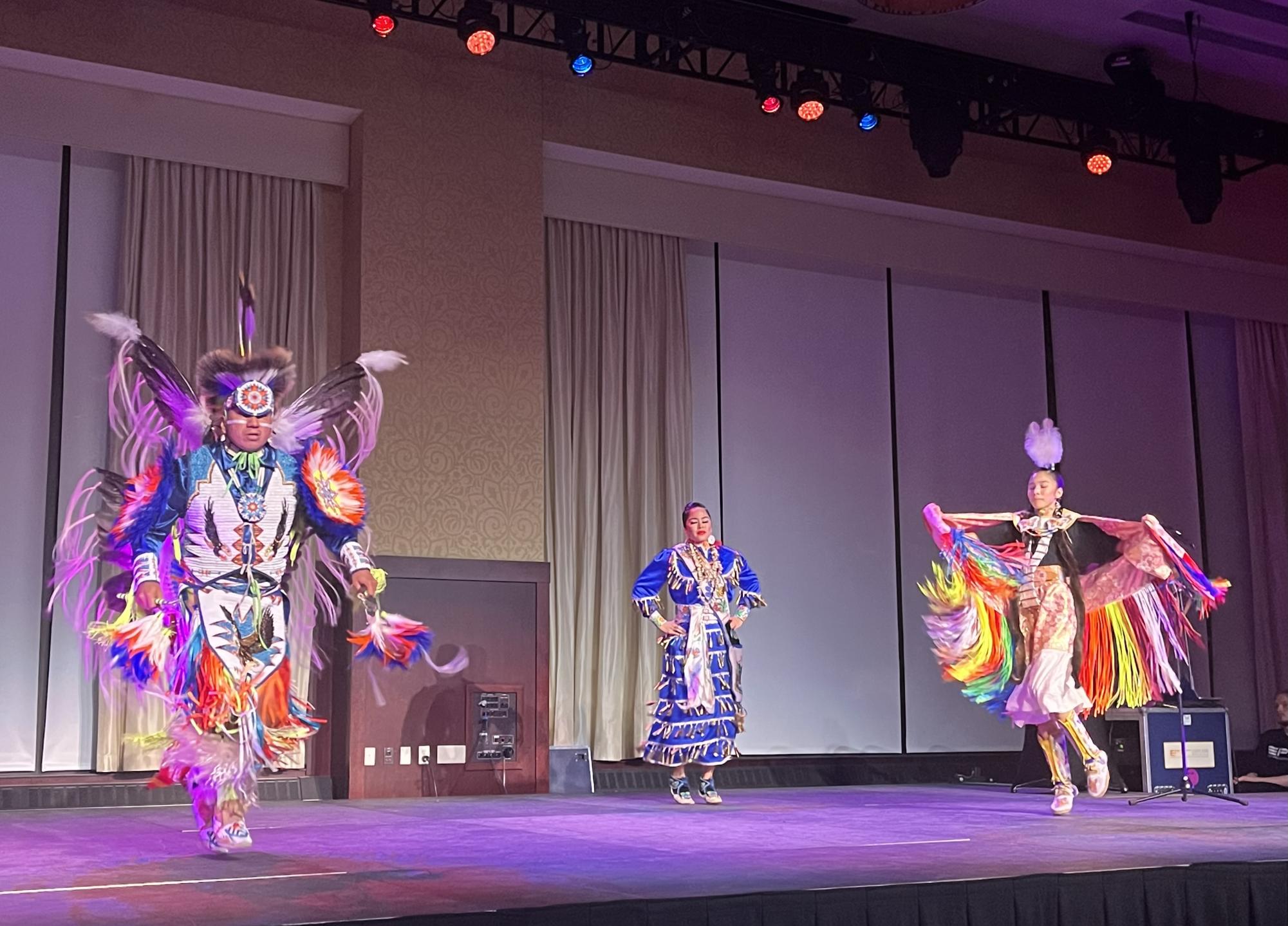 The Native Pride Dancers begin their performance as a trio, showcasing each of their unique dances and regalia.