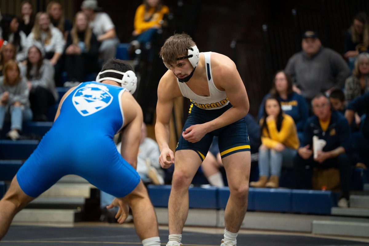 Jared Stricker looks for an opportunity to take down his opponent (Photo by Zach Jacobson, used with permission by Blugold Athletics)
