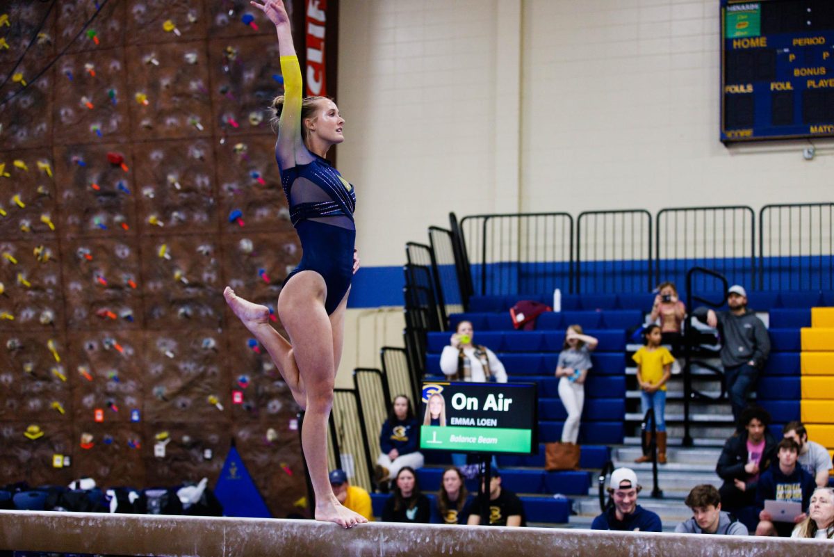 Second-year Blugold Emma Loen performing her balance beam routine.
(Photo used with permission from Austin Tanner)