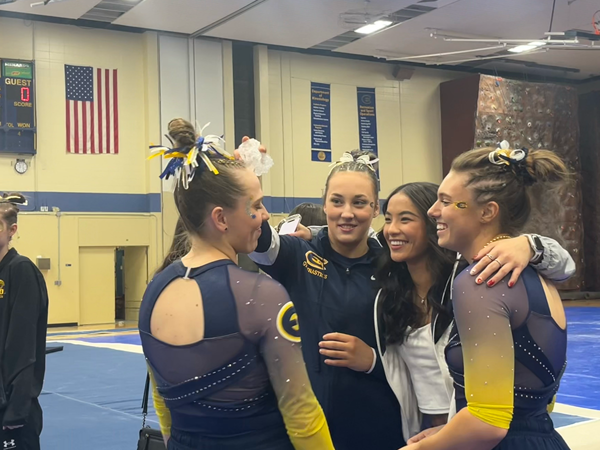 UW-Eau+Claire+gymnasts+in+full+spirits+after+their+record-setting+meet.