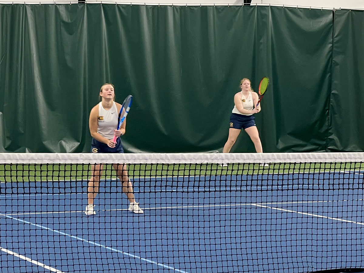 Addy Farber and Hailey Beisel receive a serve from the Bethel Royals in a previous match.