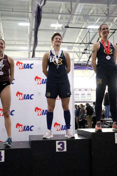 Blugolds Anna Schueth and Mikayla Hady take their places on the podium. Photo by Autumn Krause from UW-Whitewater Athletics used with permission