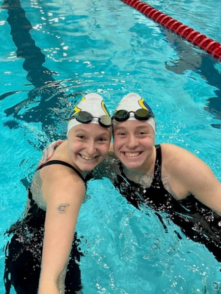 McGuine smiles with her teammate in the pool.
Photo by Shane Opatz from UWEC Photo used with persmission