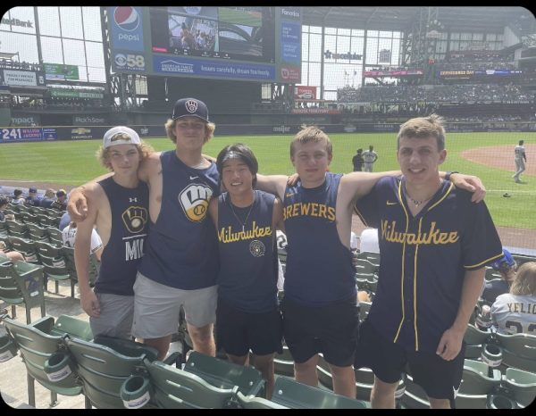 My friends from high school and I posing for a picture before a game between the San Francisco Giants and Milwaukee Brewers. I made the amateur decision of buying tickets directly in the sun and not bringing sunglasses with me to the game.