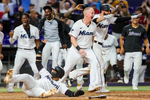 The Marlins celebrate a walk-off win at home. (Photo from Sam Navarro/USA Today)
