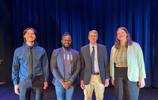 2024 Devroy Fellow Jhett Sherry, CJ professor Pechulano Ngwe Ali, Washington Post journalist Patrick Marley and 2023 Devroy Fellow Maddie Kasper pose for a picture after the forum (left to right). 