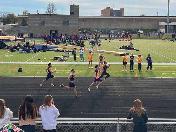 The first heat of the men’s 4x400 relay featured four runners in a tight race. 

