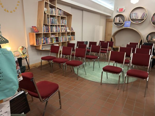 The chairs set up for Haala and Weichelt as well as chairs for audience members. 